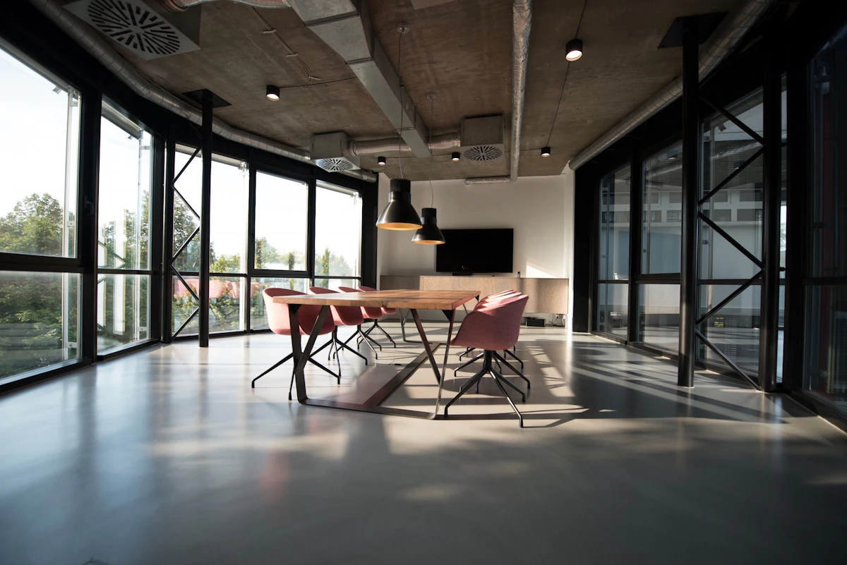 Office meeting area with a table and chairs